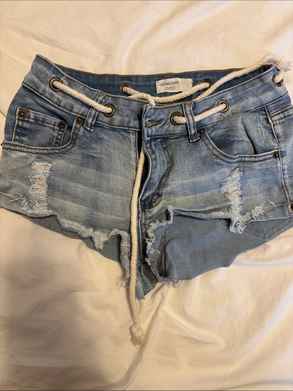 Ocean Drive Light Wash Distressed Denim Shorts with Rope Waist